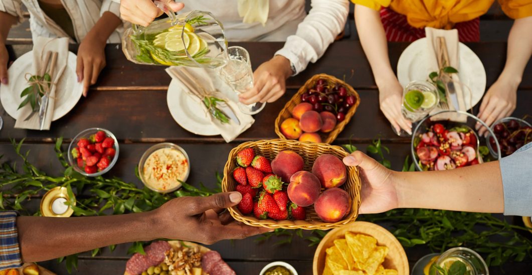 friends-at-summer-dinner-table-above-view-2023-11-27-05-21-38-utc