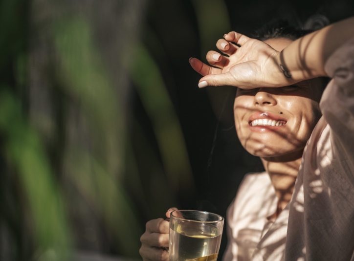 woman-enjoying-tea-outdoors-in-relaxing-sunlight-2026-03-11-00-56-33-utc